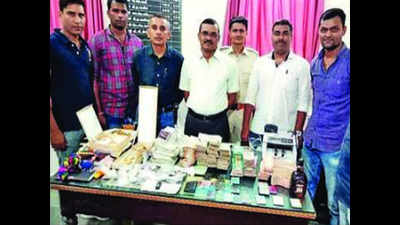 In liquor raid, cops find Rs 45 lakh cash, Rs 19 lakh worth gold