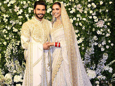 who designed deepika padukone wedding dress Sabyasachi Lehenga Deepika's Reception Dress Deepika Padukone Wedding Dress  Photos Cheap