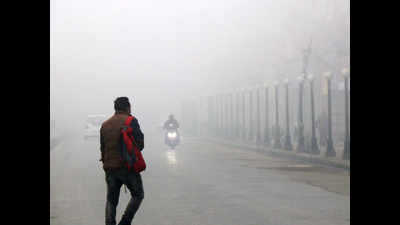 On season s coldest day Delhi air improves to poor Delhi News