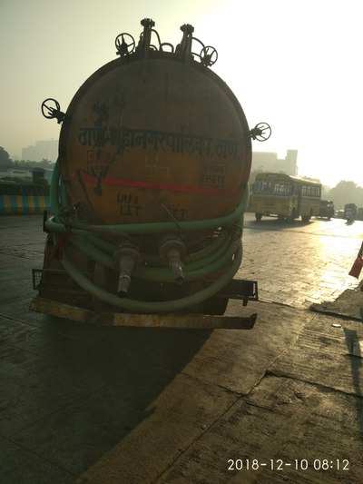 TMC Sewage tanker traveling on opposite side