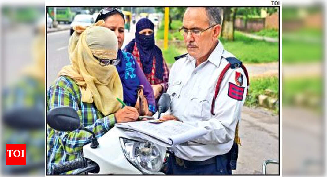 Panchkula Traffic Police 1,100 women fined for not wearing helmet in