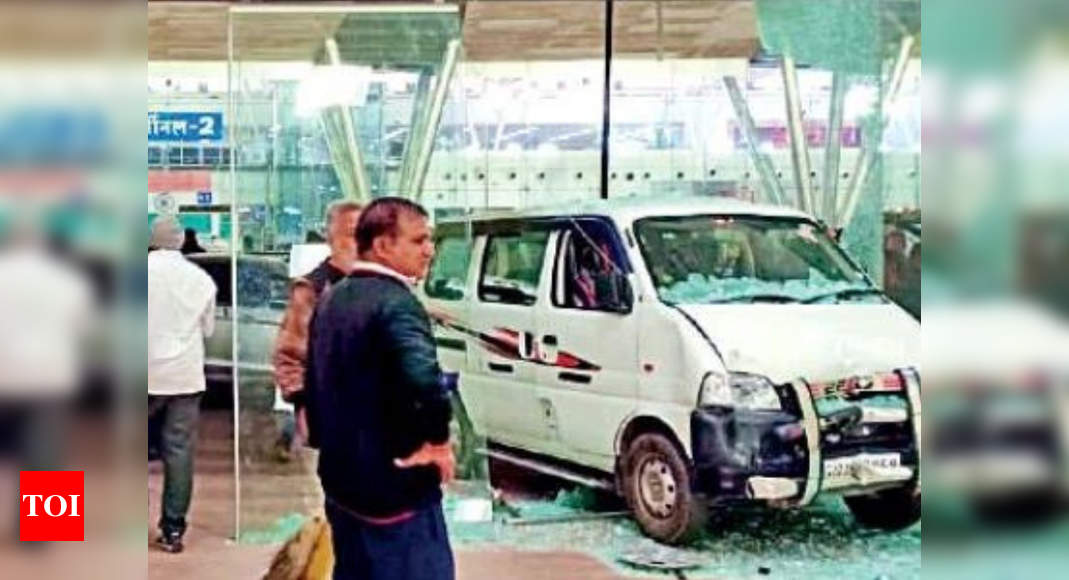 Ahmedabad: Car rams into glass facade at airport | Ahmedabad News