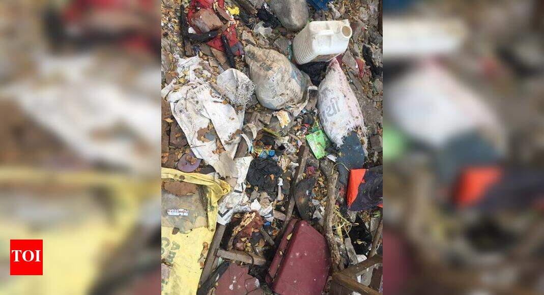 DUMPING GARBAGE NEXT TO CHURCH Times of India