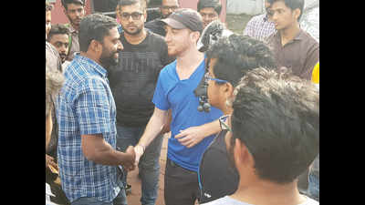 Blogger Drew Binsky interacts with Kochi youth