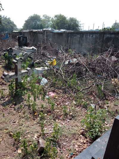 Cemetry made a garbage dump by slum dwellers