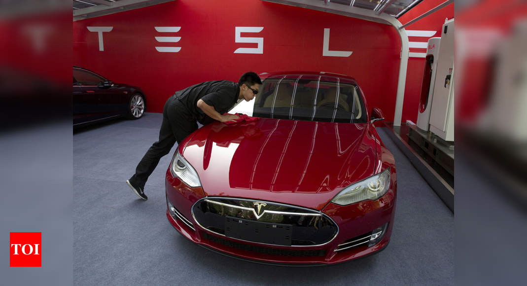 Tesla Jobs Cut Tesla to cut workforce by 7, says 'road ahead is very