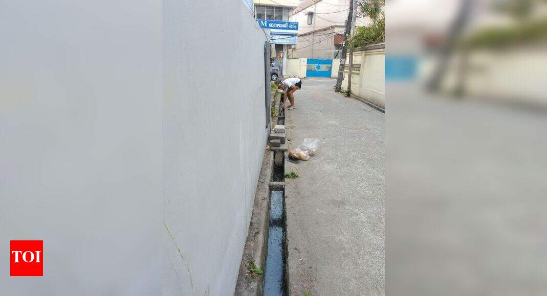 gutter not covered and locals dumping waste - Times of India
