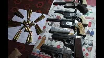 Two smugglers held with arms and ammunitions