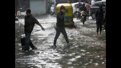 Waterlogging, cave-ins trouble commuters