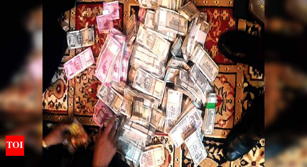 Rs 100 crore in assets and cash seized from babu who wrote GST book