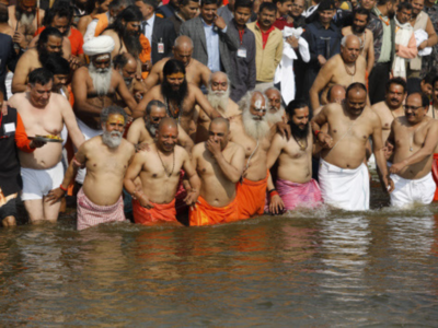 Yogi cabinet meets on Kumbh ground, takes dip in Sangam