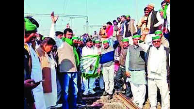 Farmers block railway track to protest against pending sugarcane dues