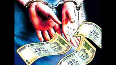 Electricity department staff held for taking bribe