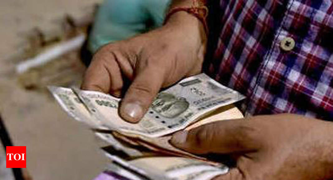 Rupee gains 8 paise to 71.49 vs dollar in early trade