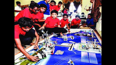 Kids learn lessons in collaboration, creativity as toy robots slug it out