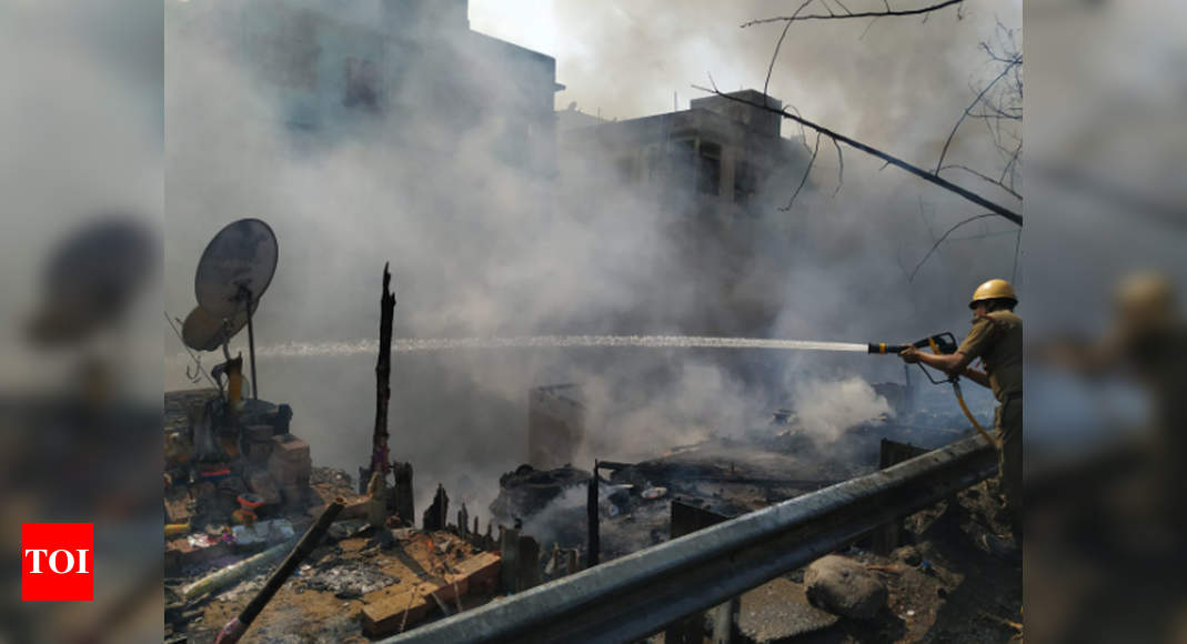 West Bengal: Fire near Baranagar station tracks disrupts train services ...