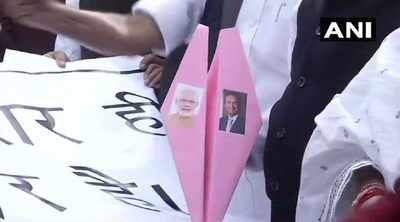 With paper planes, Congress MPs protest outside Parliament over Rafale deal