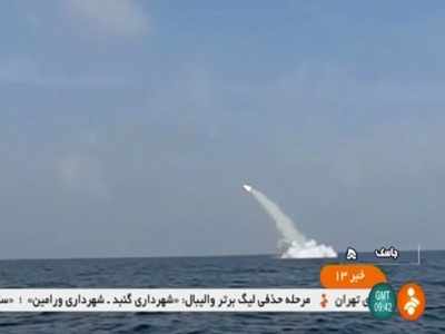 Iran launches cruise missile from submarine during drill