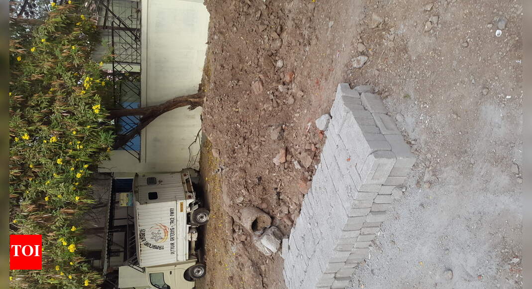 resurfacing of road dug up for drainage line Times of India