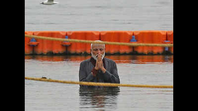 PM Narendra Modi takes a dip, attends aarti at Kumbh