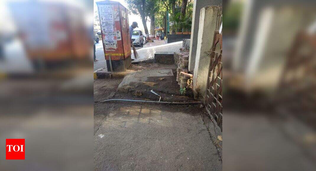 Encroachment at footpath by xpoint bldrs. - Times of India