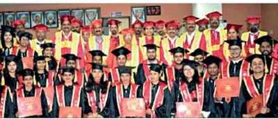 Collegians all smile at their convocation ceremony