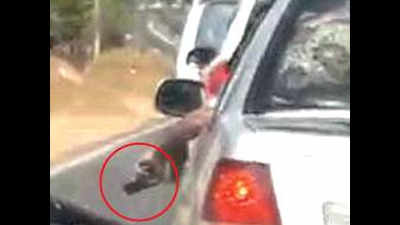 Man flaunts ‘pistol’ from car, police begin search