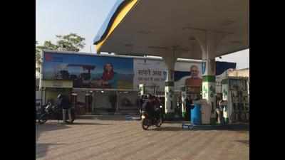 Posters down, but petrol pumps don PM hoardings