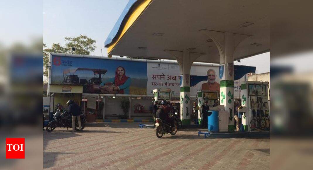 Posters down, but petrol pumps don PM hoardings Noida News Times of