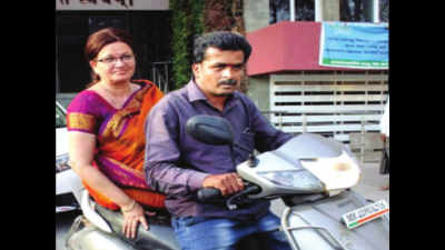 Pune: Mayor draws flak for picture on scooter sans headgear