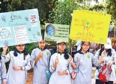 1,000 school children rally against tree-felling at KBR
