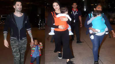 Sunny Leone’s daughter Nisha Weber waves at the paparazzi adorably at the Mumbai airport