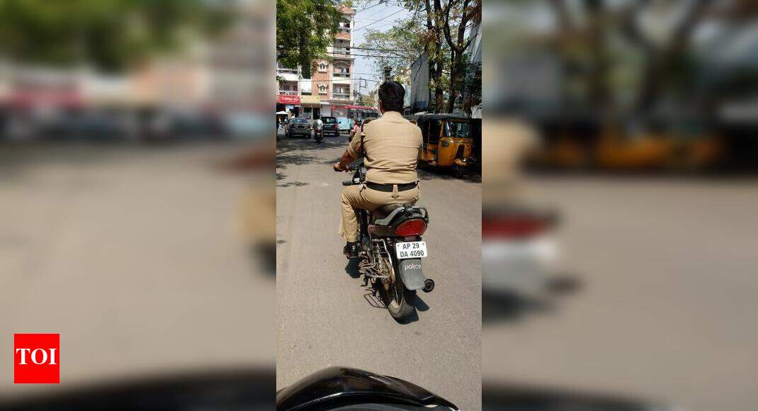 Cops permitted to ride bike without helmet Times of India