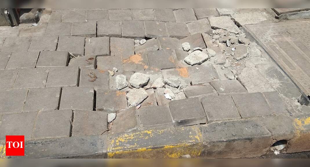 Broken Footpath - Times of India