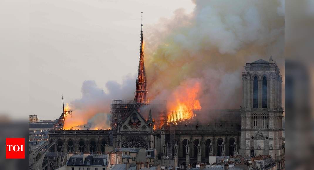 Youtube Flags Notre Dame Cathedral Fire As 9 11 Conspiracy Times Of India