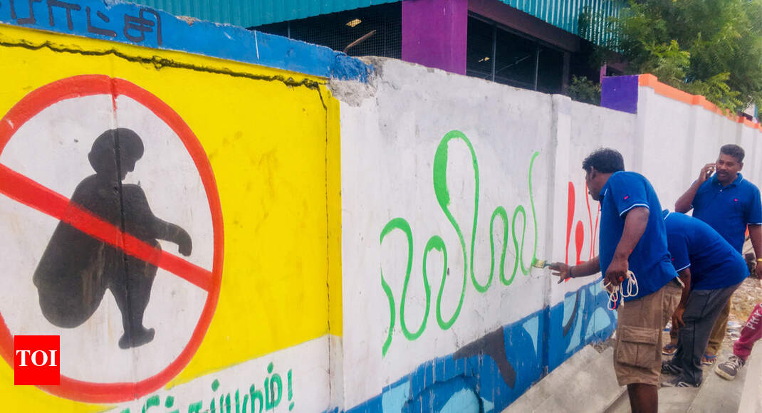 Trichy volunteers paint wall with cleanliness messages Trichy News
