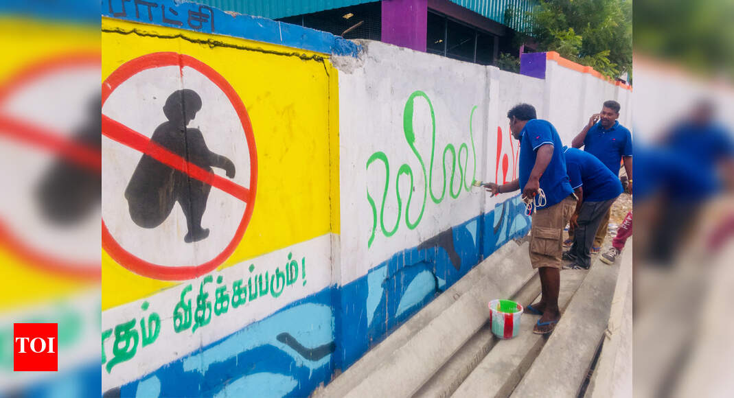 Trichy volunteers paint wall with cleanliness messages Trichy News