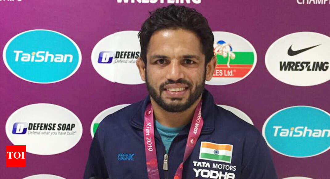 Amit Dhankar settles for silver, Rahul Aware for bronze in Asian Wrestling Championships - Times of India
