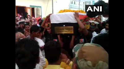 Navy officer Lt. Commander Dharmendra Chouhan's body brought home