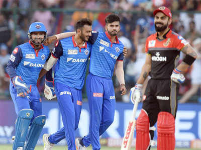 Dc Vs Rcb: Delhi Capitals Beat Rcb To Seal Playoff Berth After Seven 