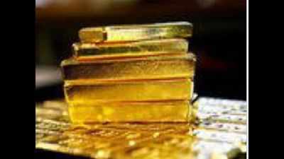 900g gold seized from 2 passengers