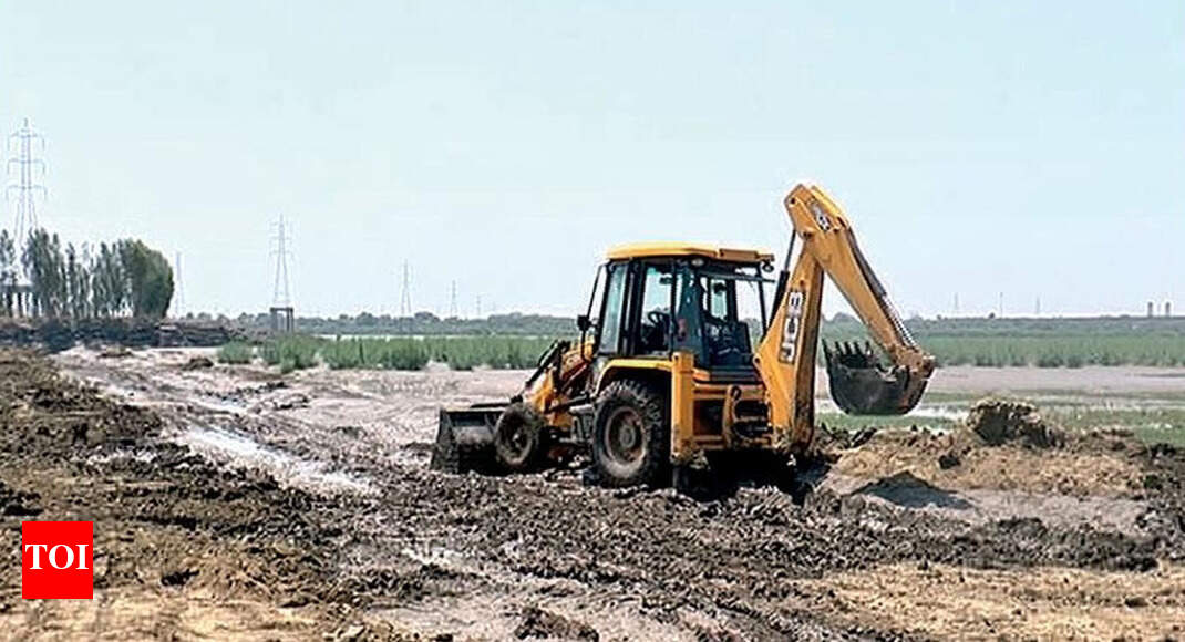 Diamond baron’s ‘kutcha’ road razed Surat News Times of India
