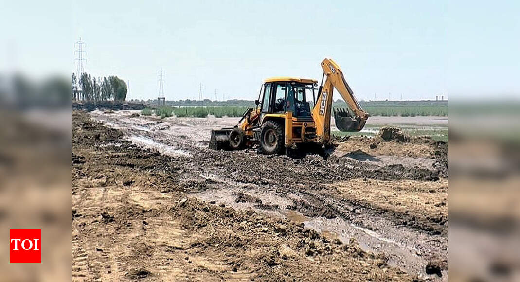 Diamond baron’s ‘kutcha’ road razed Surat News Times of India