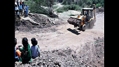 Peeved at delays, villagers shell out funds for pond
