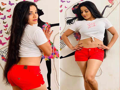 Nazar actress Monalisa flaunts her mid riff in super hot neon shorts and white tee