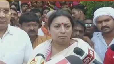 Emotional Smriti Irani promises justice to murdered aide’s family in Amethi