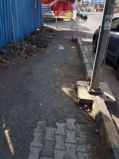 foot path as poor as it can - Times of India