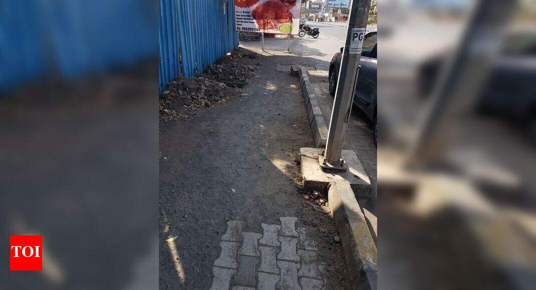 foot path as poor as it can - Times of India