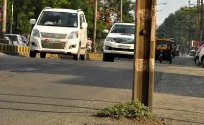 Image result for NMC, govt agencies concretizing roads without shifting power poles, infrastructure