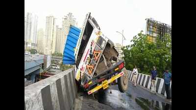 Thane: Traffic affected as container topples on Majiwada flyover